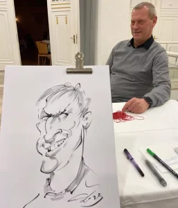 Karikieren.