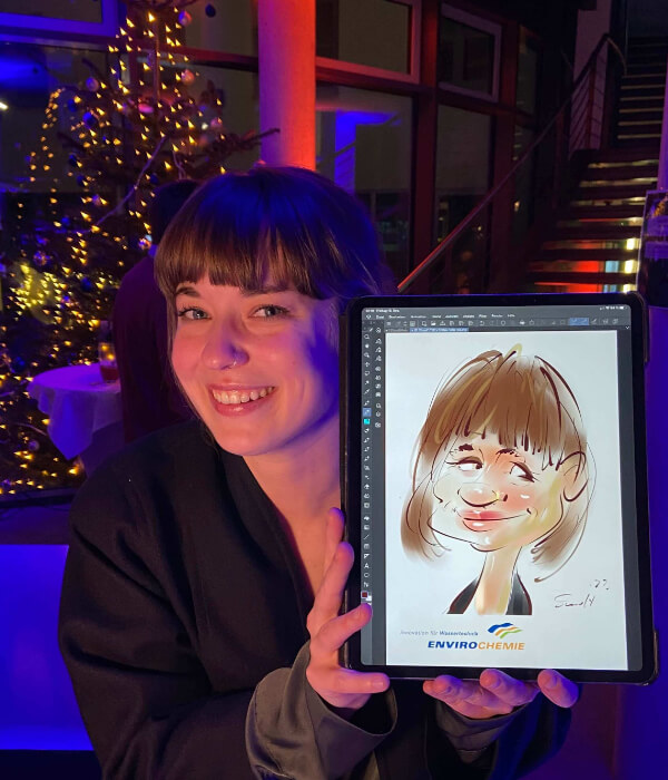 iPad Zeichner in Dresden. Digitale Karikaturen bei der Feier.